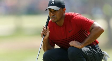 an in-depth review of how Tiger Woods shocked the golf world by switching his putter.